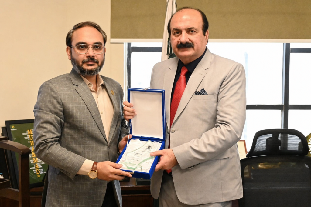 Chairman, Global Peace Summit, Shaikh Mahmud bin Ilyas, presents a shield to Chairman, Prime Minister's Youth Programme, Rana Mashhood Ahmed Khan